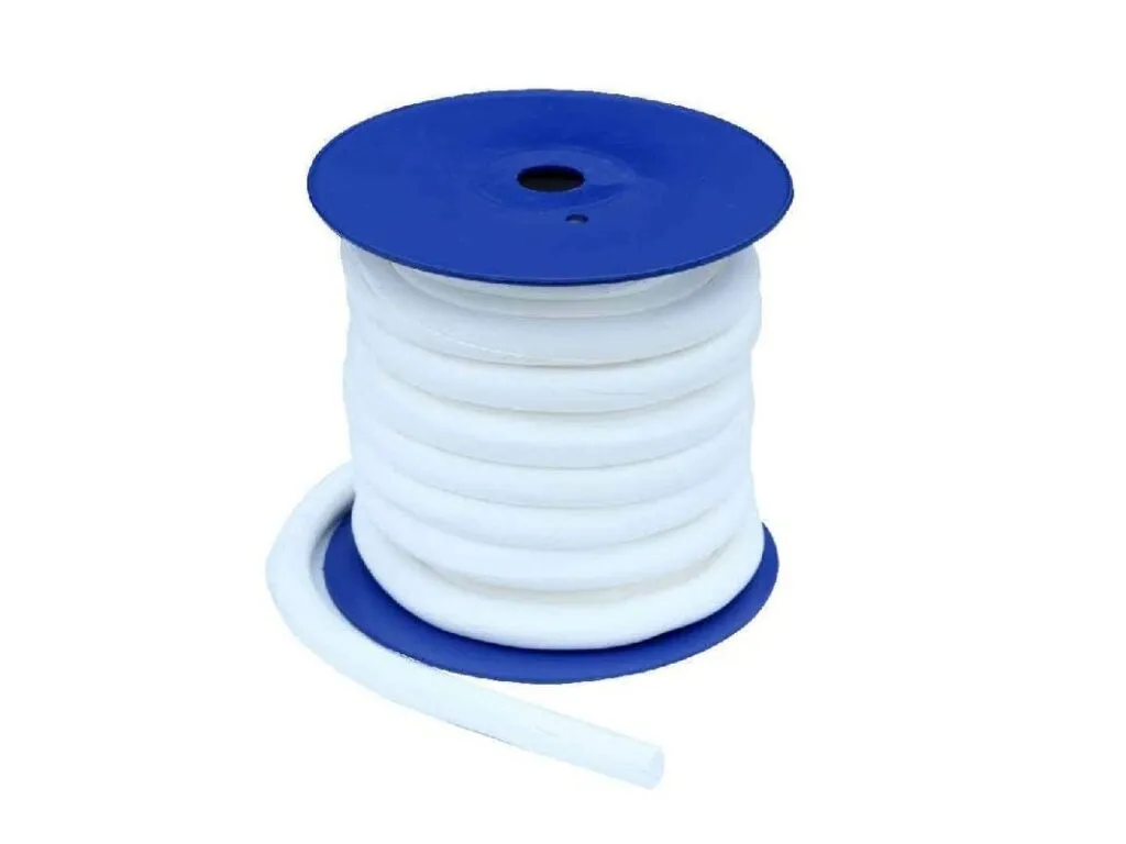 Băng PTFE giãn nở: Cuộn băng PTFE giãn nở trắng dày trên lõi nhựa xanh