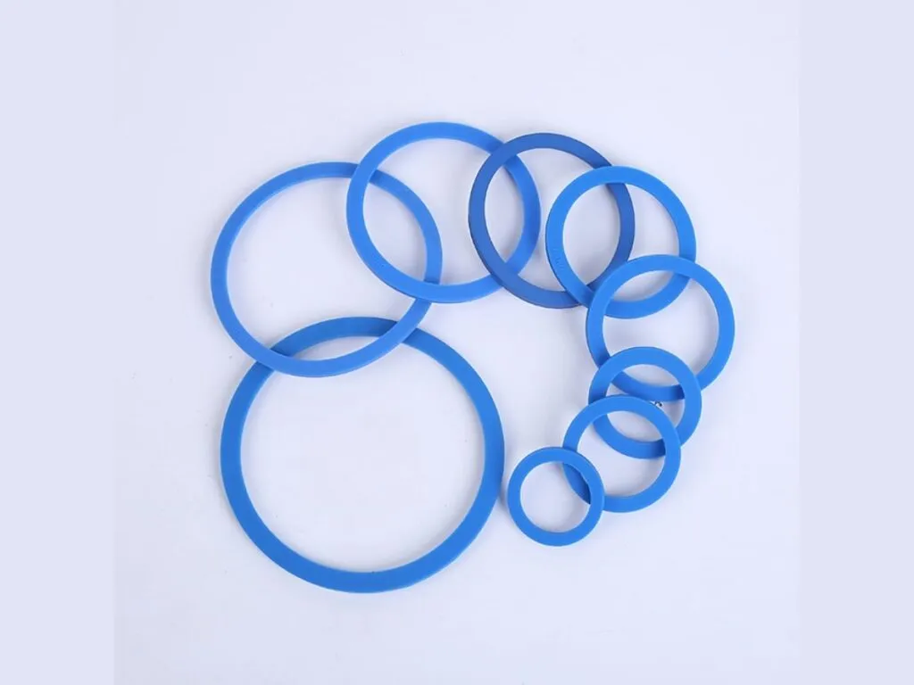 Gioăng tri clamp: Nhóm gioăng tri clamp xanh dương nhiều cỡ chồng lên nhau