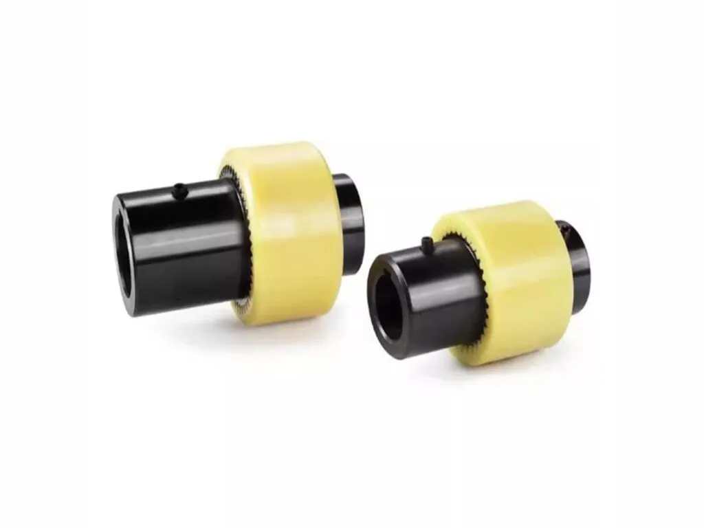 Khớp nối vỏ nhựa: Hai bộ khớp nối vỏ nylon vàng với moay-ơ thép đen đặt chéo nhau