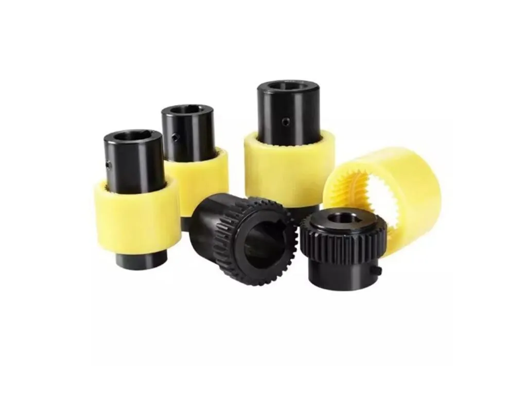 Khớp nối vỏ nhựa: Nhóm khớp nối gồm moay-ơ thép đen và vòng răng nylon vàng đặt rời
