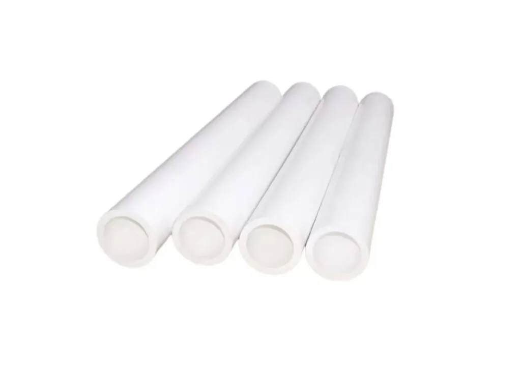 Ống teflon PTFE: Bốn ống teflon trắng nằm song song, lòng ống rõ